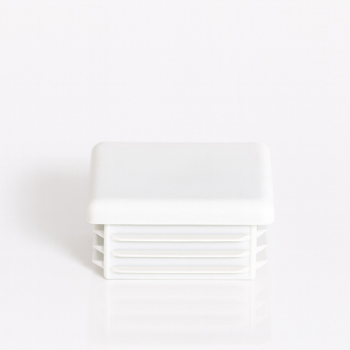 Tuolien jalkojen suojukset, sisäpuolelta neliönmuotoiset muovista, useita värejä